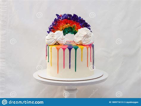 Lgbt Rainbow Cake With Melted Chocolate And Caramel Rainbow On White
