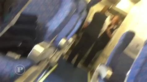 footage emerges of hijacker and british passenger posing for photograph