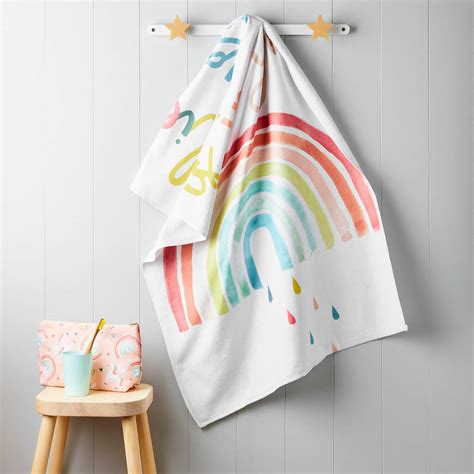 childrens personalised rainbow swimming towel  tilliemint notonthehighstreetcom