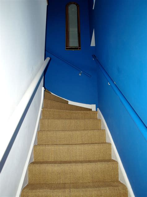 staircase  blue walls  carpeted steps