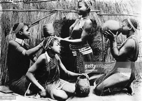 south africa zulu girls drinking bear probably in the 1910s photo d