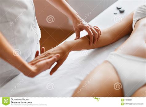 Spa Treatment Body Care Massage Of Human Hand In Spa Salon Stock