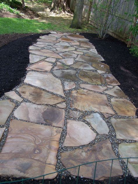 irregular natural stone permeable patio  pea gravel