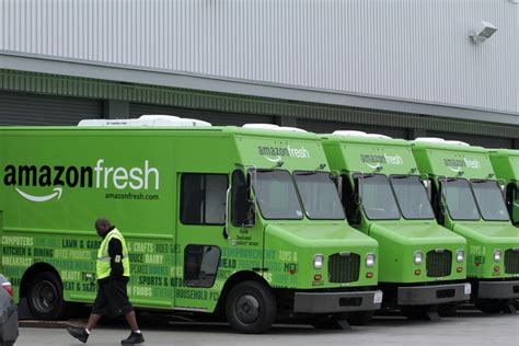 amazon launches grocery delivery service  uk  compete  tesco