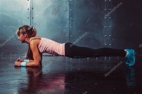 Slim Fitness Young Woman Athlete Girl Doing Plank Exercise Concept