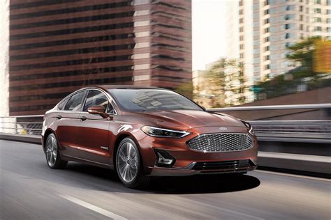 ford fusion hybrid review trims specs  price carbuzz