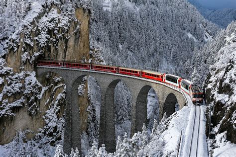train railway bridge winter snow trees forest mountain tunnel switzerland wallpapers hd
