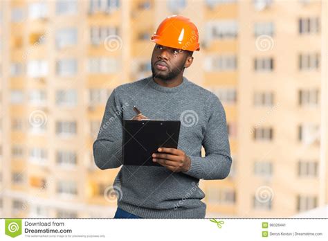 construction supervisor writes  clipboard stock image image