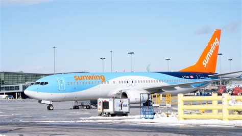 westjet  shut  sunwing airlines merge   mainline business