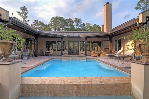 pin  martha turner sothebys intern  water features pool house plans  shaped houses