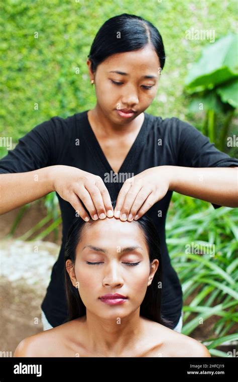 Woman Receiving Scalp Massage At Rebab Spa Kayumanis Gangsa Bali