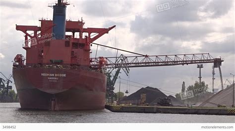 discharging bulk carrier  unloading gravel stock video footage