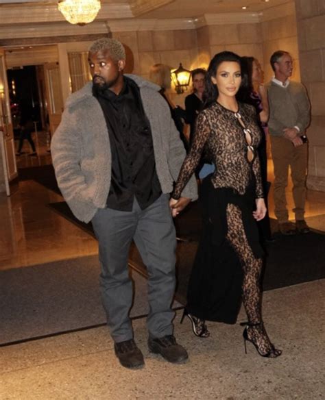 kim kardashian rocks a completely see through lace catsuit for john
