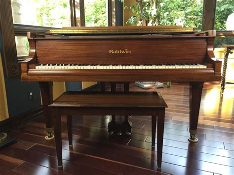 beautiful baby grand baldwin piano  bench  restored