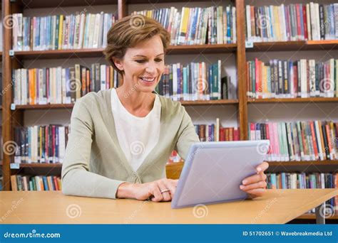 smiling teacher  tablet pc  library stock image image  happy cheerful