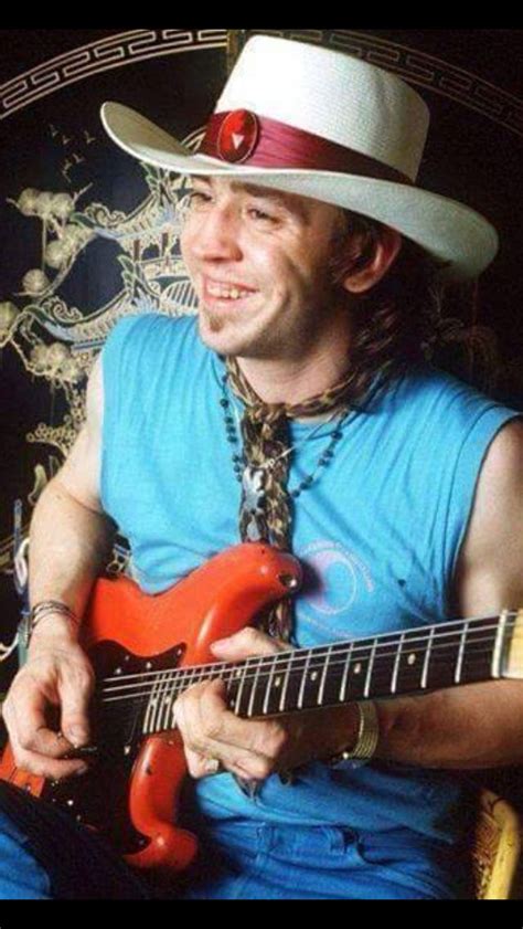stevie ray vaughan poses for a portrait at his home in