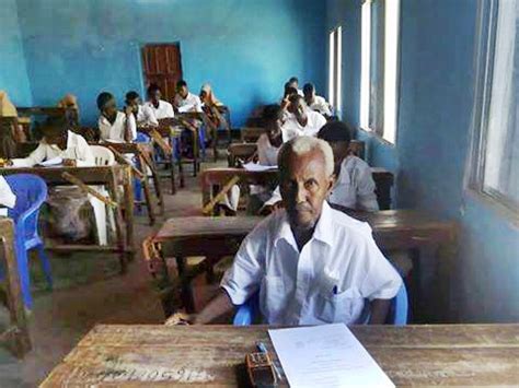 year  man sitting   secondary school examinations