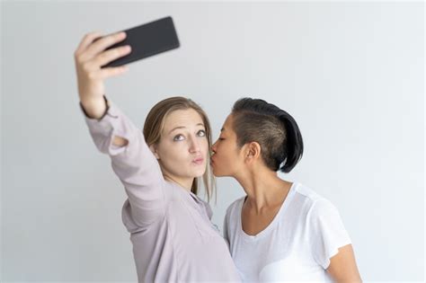 Free Photo Women Kissing And Taking Selfie Photo