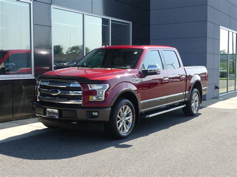 pre owned  ford   lariat wd supercrew  box