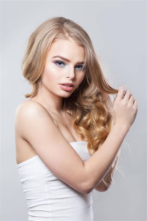 Fashion Beauty Portrait Of Beautiful Woman With Long Blonde Hair Stock