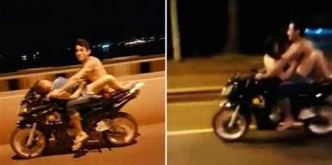 this couple caught on video having sex on a motorcycle
