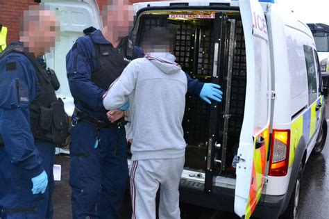police arrest 14 suspected drug dealers during dawn raids in oldham