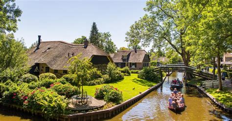 amsterdam giethoorn enclosing dike day trip  boat  getyourguide