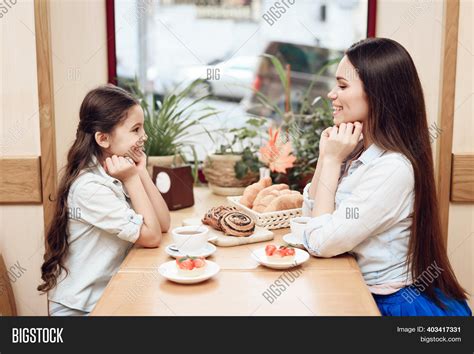 Mother Daughter Eating Image And Photo Free Trial Bigstock