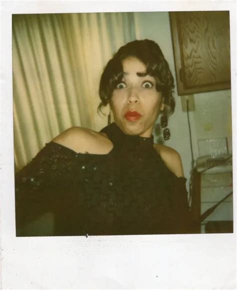 vintage polaroid photo startled sexy african american woman red lips