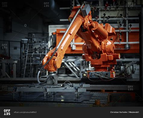 industrial robot arm   metalworking stock photo offset