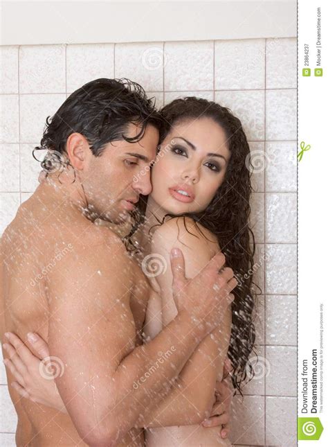 Naked Man And Woman In Love Are Kissing In Shower Royalty