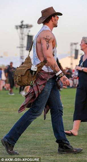 Coachella Festival Fun Encourages Twilight Star Kellan Lutz To Show Off