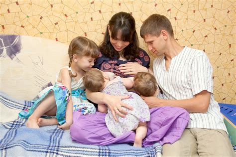 The Best Breastfeeding Positions For Twins According To Experts
