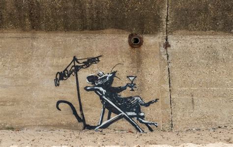 banksy unveils series   artworks called  great british spraycation favorite hits