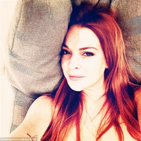 Lindsay Lohan Flashes Midriff In A Revealing Crop Top As She Gets
