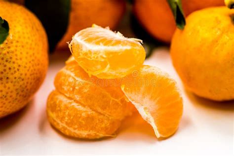 Peeled Tangerine Or Mandarin Fruit Isolated On White Background Stock