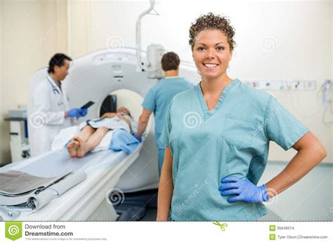 nurse with colleague and doctor preparing patient stock