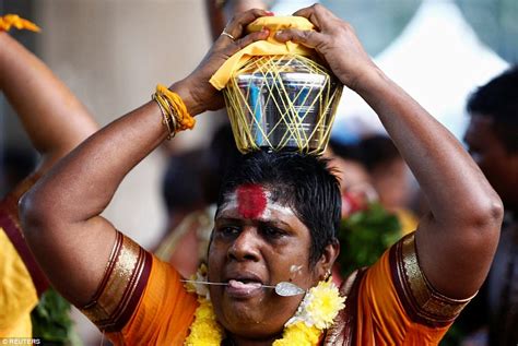 worshippers pierce skin with hooks in hindu festival daily mail online