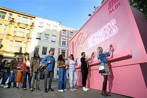 pictures aldi launches rose wine dispensing billboard  manchester retail gazette