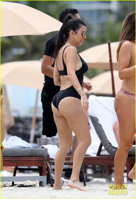 kourtney kardashian looks sexy in her one piece in miami