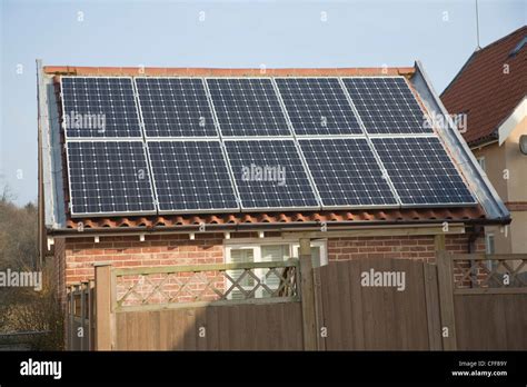 domestic solar panel array  garage roof stock photo royalty