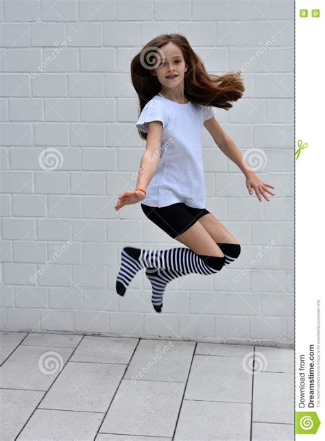 jumping girl stock image image of braces knee jumping