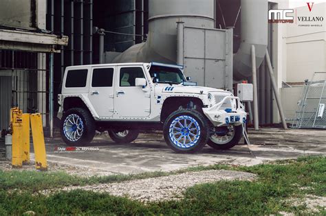 lifted stylish white jeep wrangler    blue vellano rims  blue accents caridcom gallery
