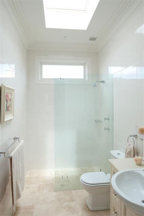 single glass piece shower against wall main bathroom small bath