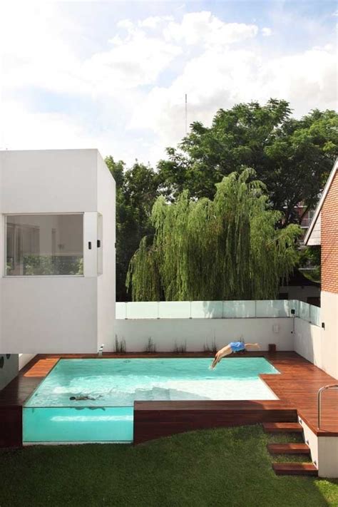 ground pool decks  modern garden swimming pool