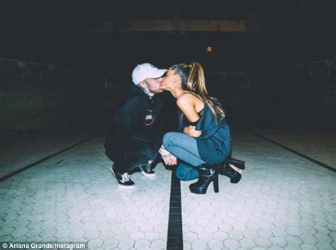ariana grande and her rapper beau pack on the pda as they