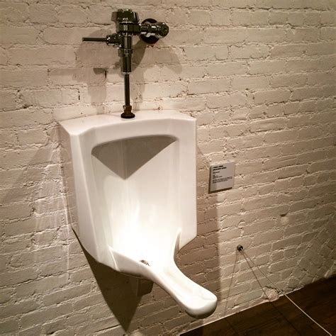 girl peeing into public urinal sexy erotic girls