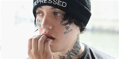 Lil Xans Face Tattoo Meanings And Pictures See Lil Xans 11 Face Tattoos