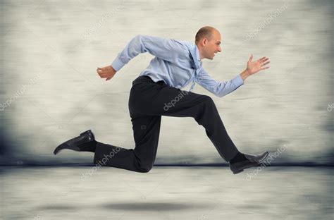 businessman running stock photo  cspaxiax