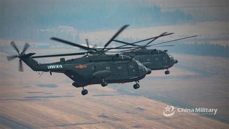 Transport Helicopters Fly In Misty Weather China Military